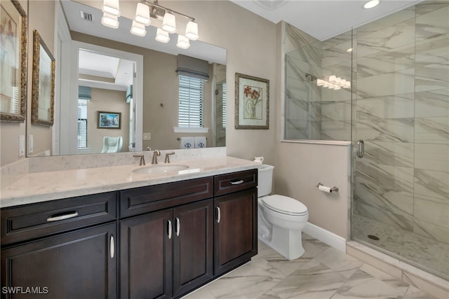 bathroom featuring an enclosed shower, vanity, and toilet