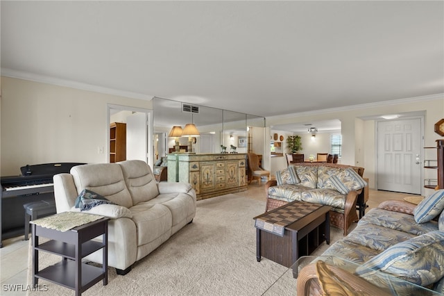 living room with light colored carpet and crown molding