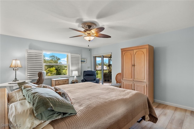 bedroom with access to exterior, ceiling fan, and light hardwood / wood-style floors