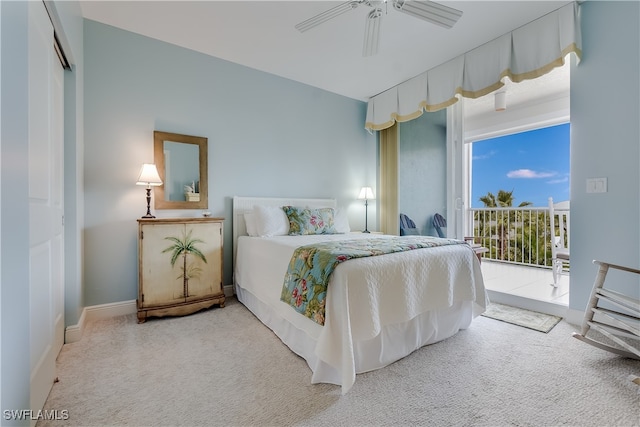 carpeted bedroom featuring access to outside, a closet, and ceiling fan