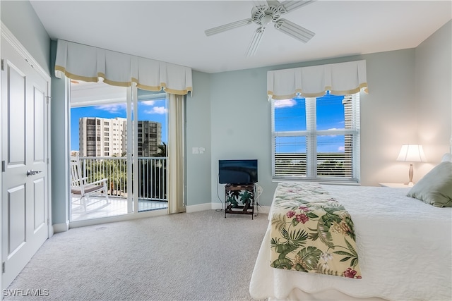 carpeted bedroom with access to outside and ceiling fan