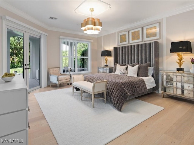 bedroom featuring visible vents, ornamental molding, access to outside, light wood-style floors, and a notable chandelier