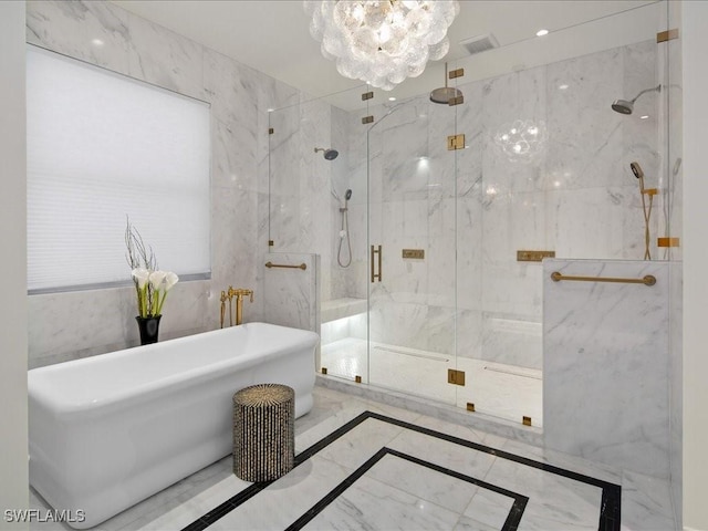 bathroom featuring a freestanding tub, a marble finish shower, a chandelier, marble finish floor, and visible vents