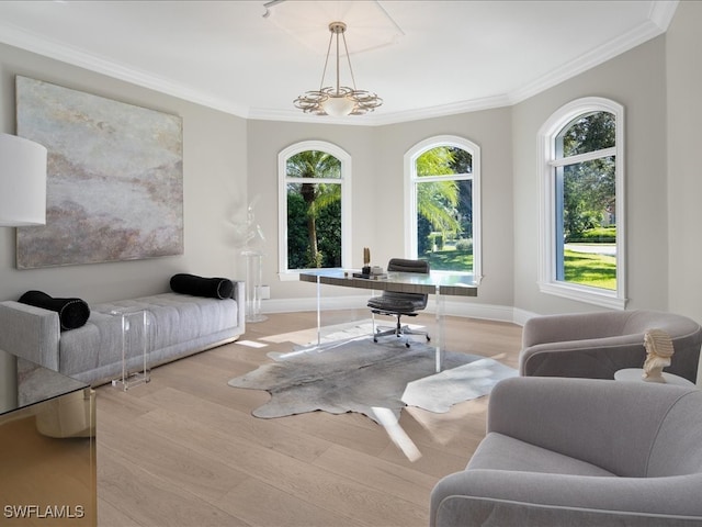 home office featuring crown molding, light hardwood / wood-style flooring, and a chandelier