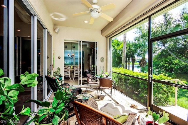 sunroom / solarium with ceiling fan