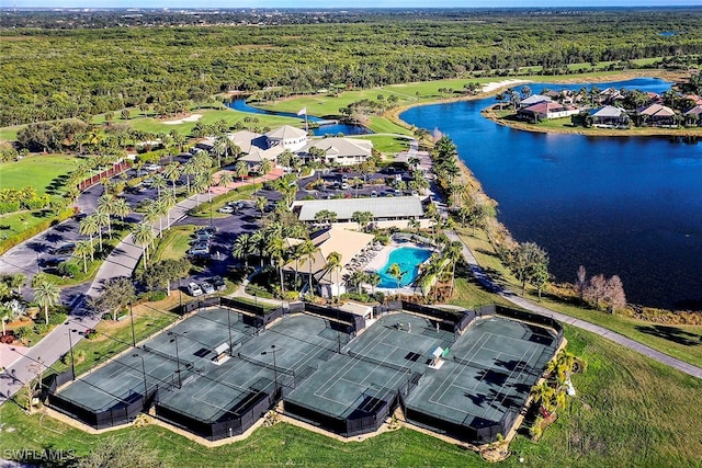 birds eye view of property with a water view