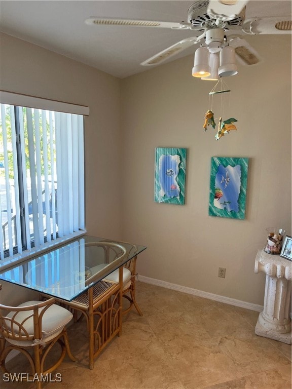 dining area with ceiling fan