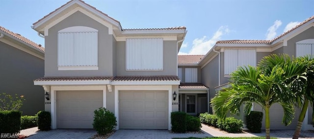 view of front of property featuring a garage