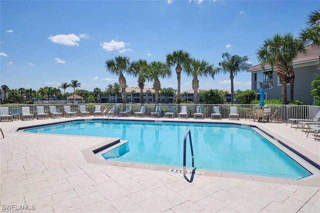 view of pool featuring a patio