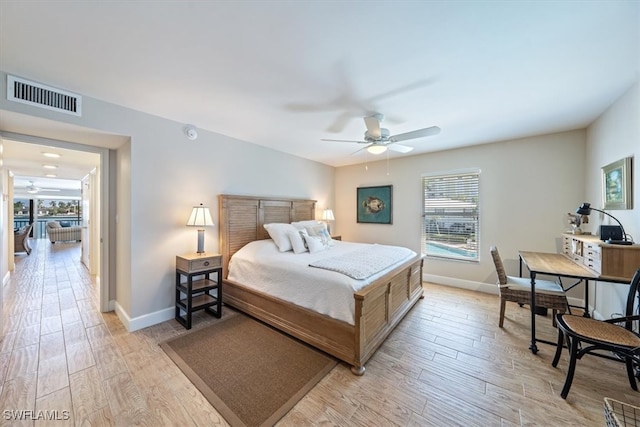 bedroom featuring light hardwood / wood-style floors and ceiling fan