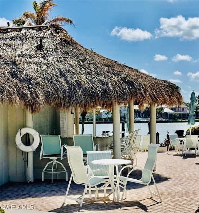 view of patio / terrace featuring a water view