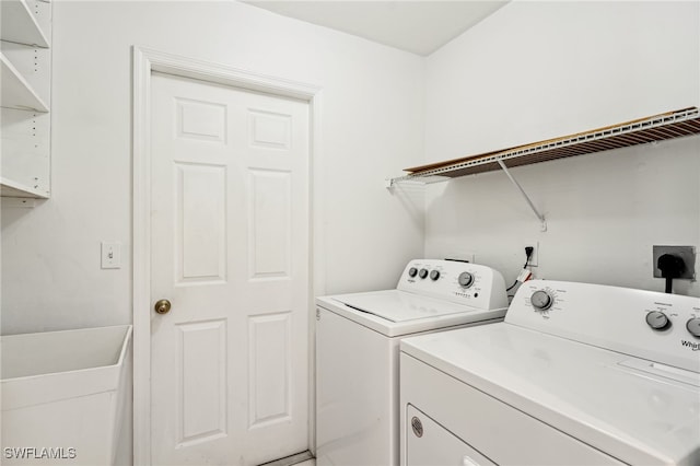 laundry area with washer and dryer