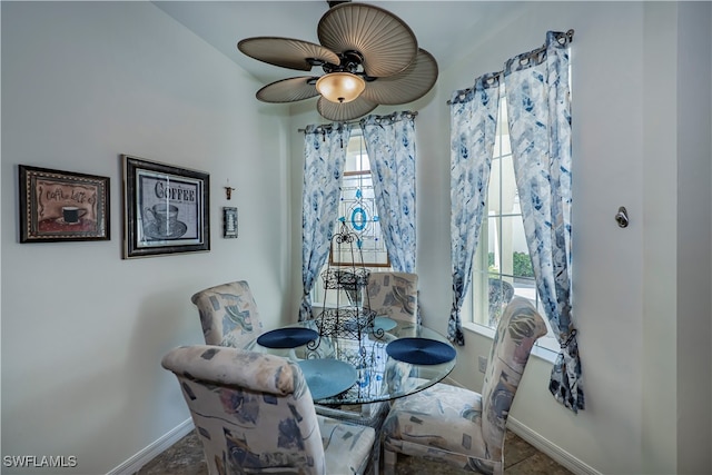 dining space featuring ceiling fan