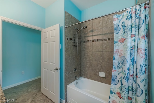 bathroom featuring tile patterned flooring and shower / bathtub combination with curtain