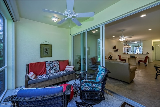 interior space featuring ceiling fan