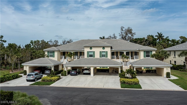 view of front of property with a carport