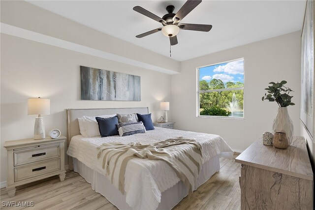 bedroom featuring ceiling fan and light wood-type flooring