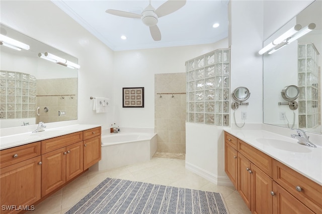 bathroom with tile patterned flooring, a sink, and walk in shower