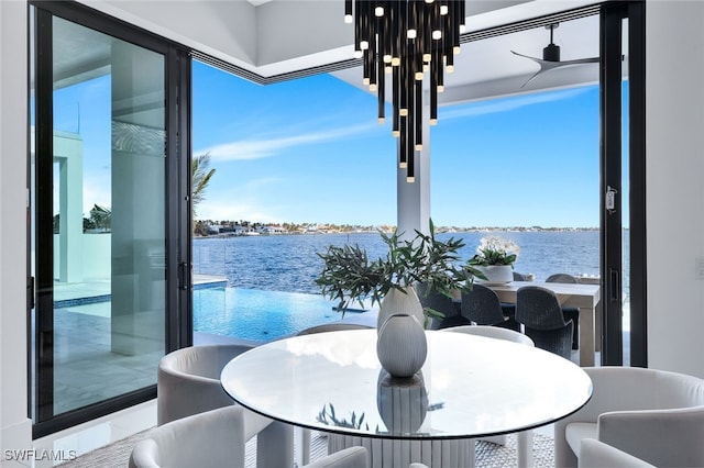 dining space with a water view