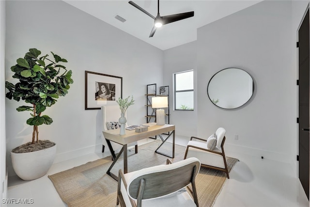 home office with ceiling fan and vaulted ceiling