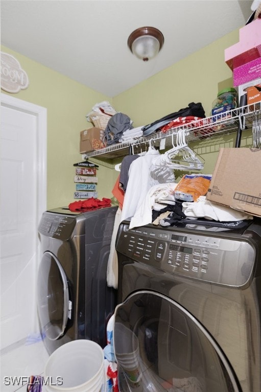 laundry room featuring independent washer and dryer