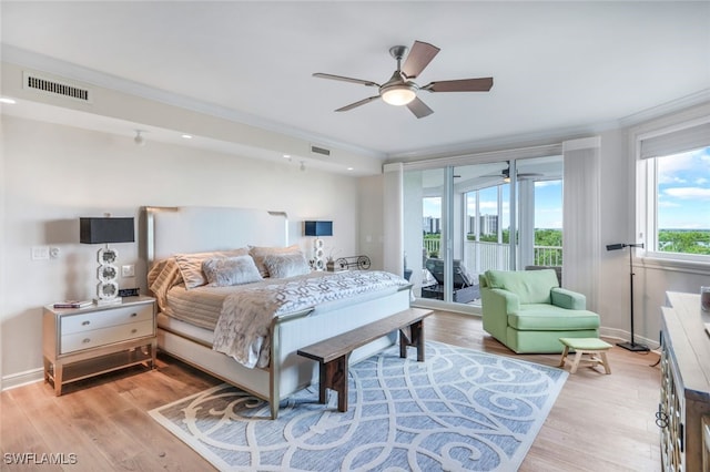 bedroom featuring light hardwood / wood-style flooring, access to exterior, crown molding, and ceiling fan