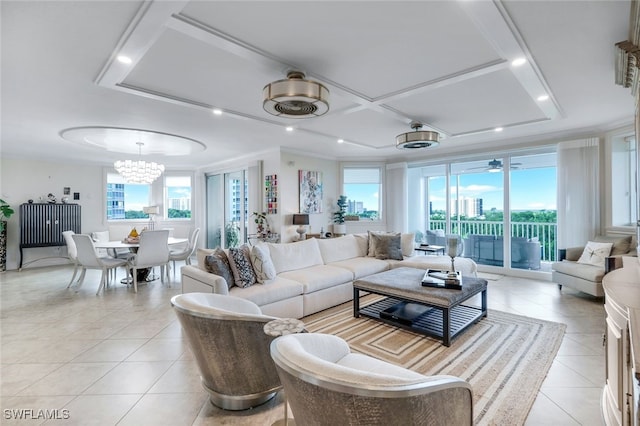 living room with a chandelier and light tile patterned flooring