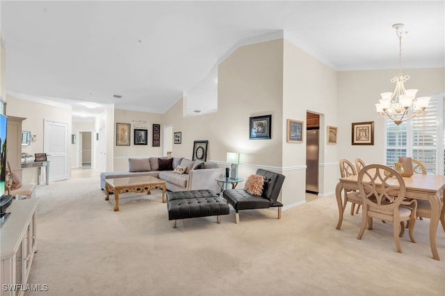 carpeted living room featuring vaulted ceiling and a chandelier