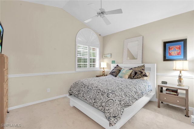 bedroom with vaulted ceiling, carpet, and ceiling fan