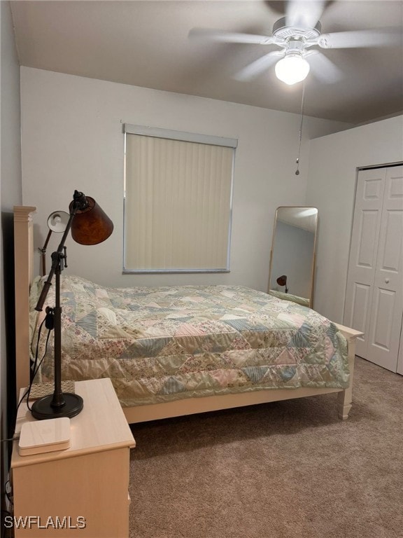 bedroom with a closet, ceiling fan, and carpet flooring