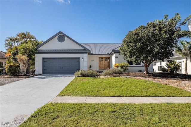 ranch-style home featuring a garage and a front lawn