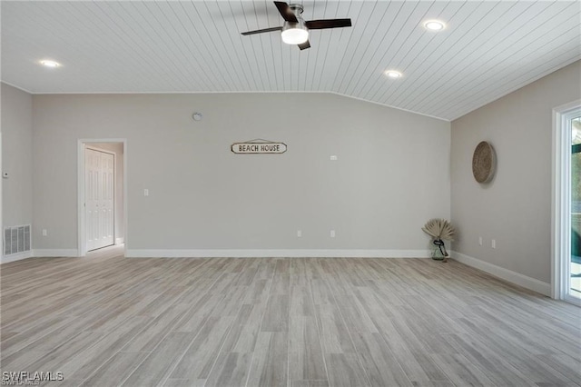 empty room featuring wood ceiling, light hardwood / wood-style floors, vaulted ceiling, and ceiling fan