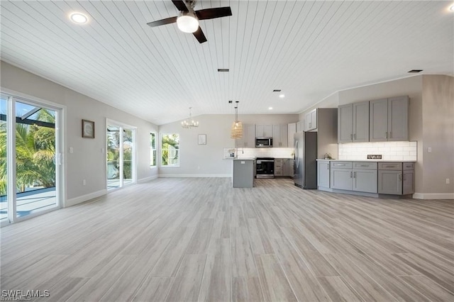 unfurnished living room with light hardwood / wood-style floors, ceiling fan with notable chandelier, vaulted ceiling, and wooden ceiling