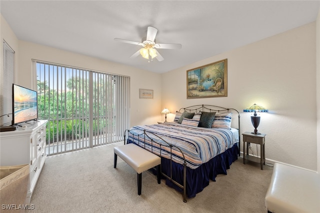 bedroom featuring ceiling fan, access to outside, and carpet floors