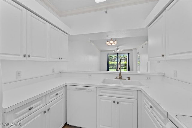 kitchen with white dishwasher, sink, and white cabinetry