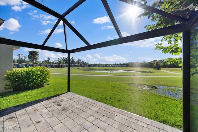 view of patio with a water view