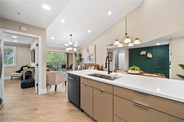 kitchen featuring dishwasher, sink, light hardwood / wood-style flooring, and decorative light fixtures