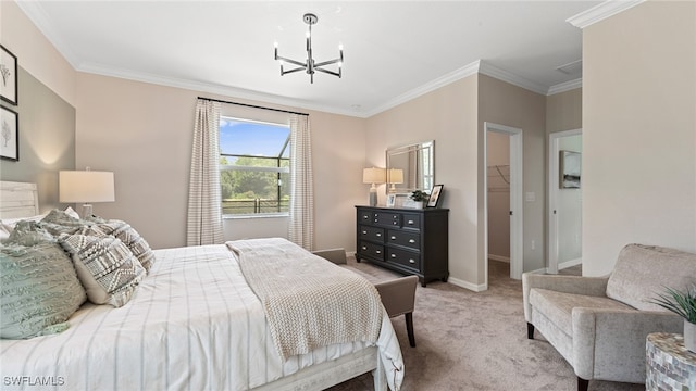 carpeted bedroom featuring an inviting chandelier, a closet, crown molding, and a walk in closet