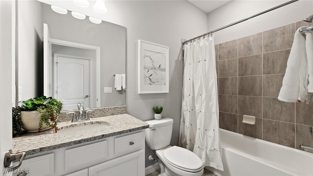 full bathroom featuring shower / bath combination with curtain, vanity, and toilet