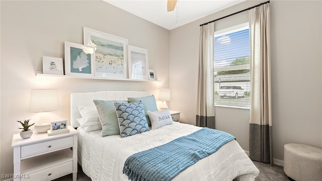 carpeted bedroom with ceiling fan