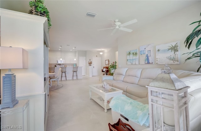 living room featuring ceiling fan