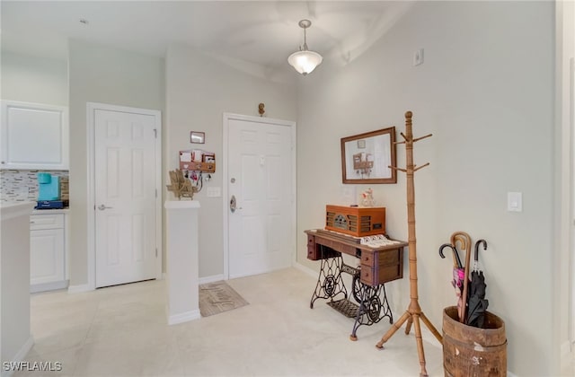 entrance foyer with light tile patterned flooring