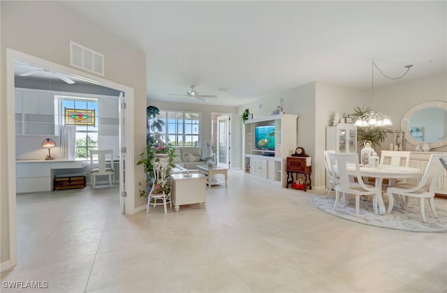 11741 Pasetto Ln Unit 404, Fort Myers, FL 33908 - living room with a ceiling fan and tile patterned flooring