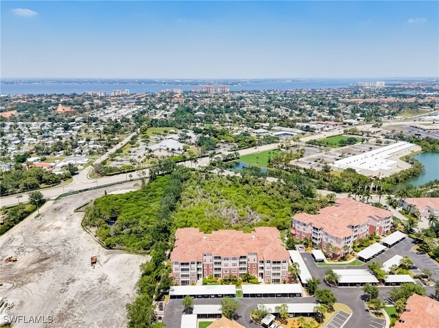 11741 Pasetto Ln Unit 404, Fort Myers, FL 33908 - view of urban area with a nearby body of water and apartment complex
