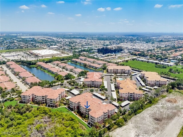 11741 Pasetto Ln Unit 404, Fort Myers, FL 33908 - bird's eye view of a large body of water and apartment complex