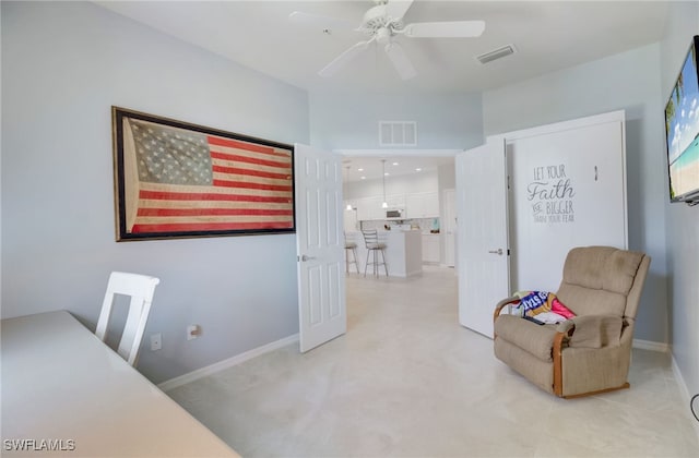 11741 Pasetto Ln Unit 404, Fort Myers, FL 33908 - sitting room featuring a ceiling fan and baseboards