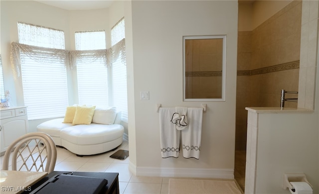 interior space featuring vanity and tile patterned floors