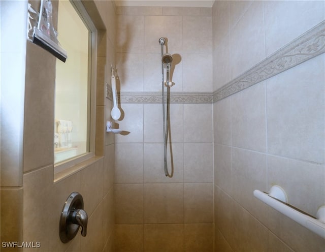 room details with a tile shower