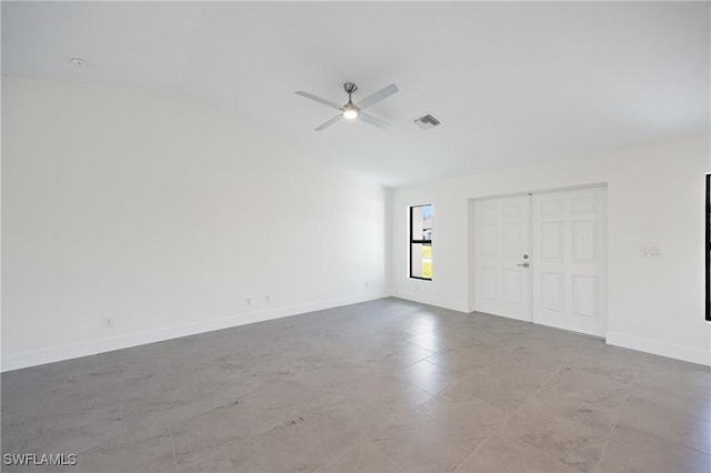 2611 NE 22nd Ave, Cape Coral, FL 33909 - empty room with a ceiling fan, lofted ceiling, and baseboards