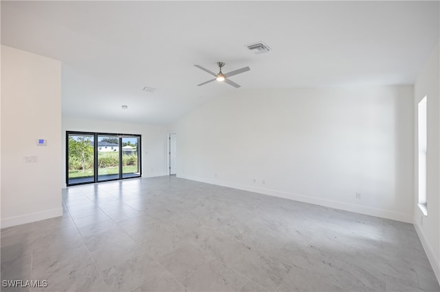 empty room featuring ceiling fan and vaulted ceiling